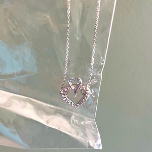 Delicate rhinestone heart necklace in original packaging brand new!